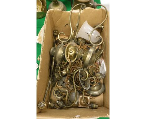 A box containing various brass rise and fall and other twin branch light fittings etc