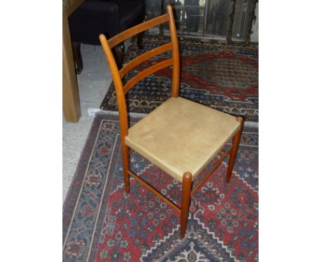 A set of six Swedish "Gemla" chairs with ladder backs over leather seats on turned legs united by stretchers