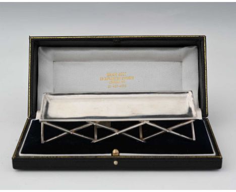 An Edwardian silver model of a folding campaign daybed, London 1902, William Comyns, ensuite with a later fitted presentation