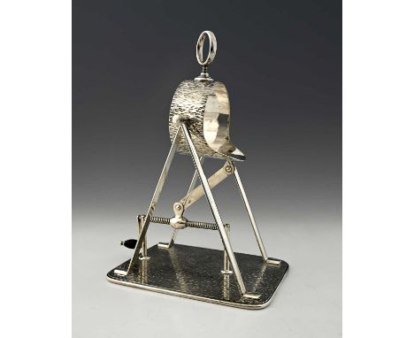 Hukin and Heath, an electroplated, patented bottle cradle, circa 1900, with textured exterior, and tilting mechanism operated