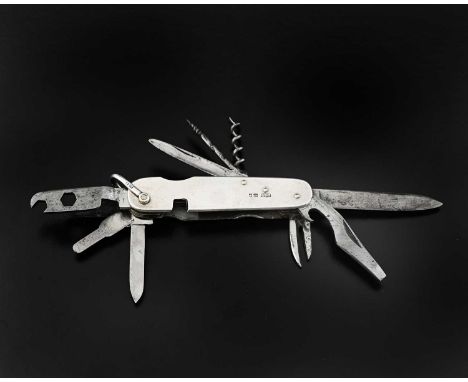 A George V silver-mounted folding knife, with nine other implements, including a corkscrew, rasp, and bottle opener, London 1