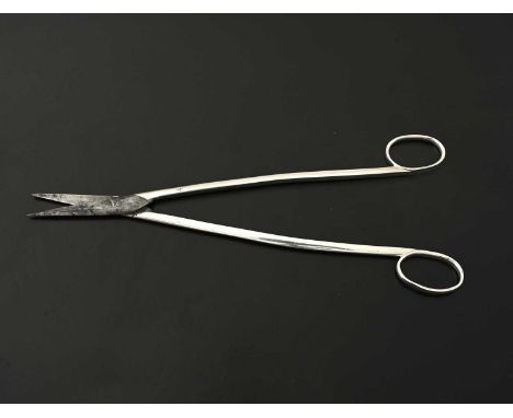 York, a long pair of George III English provincial silver and steel scissors, one arm engraved with a crest, Prince and Cattl