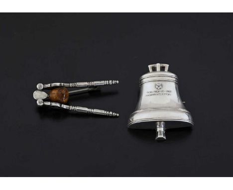 A Victorian miniature reproduction of the Great Paul Bell, formed as a brooch, length 4cm, and a novelty brooch formed as a n