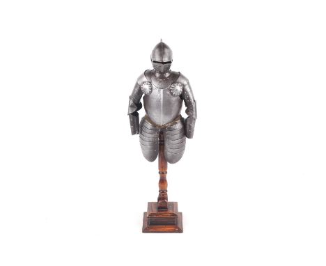 An Edwardian model scale half suit of armour mounted on a wooden base. Height of armour 35cm, total height 54cm