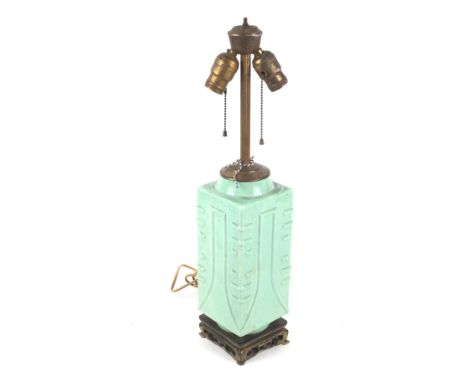 Cong lamp : A mid-20th century pale green glazed Chinese ceramic electric table lamp. With two bulb sockets and pull switches