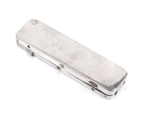 A 19th century French 'gadget' multi tool. A steel folding box opening to reveal four nail tools which unfold and use the box
