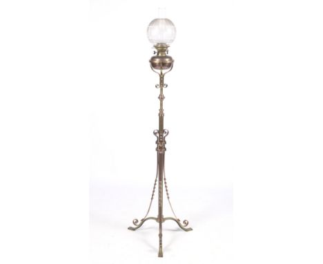 A 19th century telescopic standard lamp. Of brass and copper, with a Hinks Duplex No 2 single burner oil lamp with acid etche