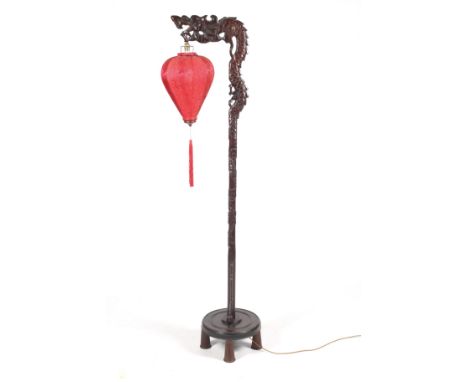 Chinese Dragon floor lamp : An early/mid-20th century rosewood carved standard lamp. Of dragon form with damask silk hexagona