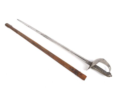 Wilkinson grenadier guards sword by Henry Wilkinson 1886. Stamped 27754 to top edge of blade. WIth leather scabbard. Total L1