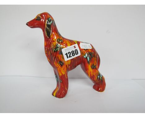 An Anita Harris Model of an Afghan Hound, gold signed, 15cm high.