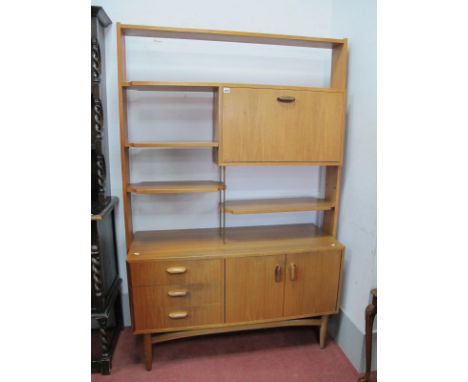 A Vintage G-Plan Teakwood Wall Unit, upper section with a fall front cupboard, adjustable shelves, base with three small draw