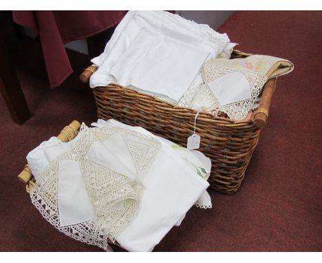 Two Baskets of Vintage Damask, Lace and Crochet Table Linen, including tablecloths, mats, napkins, tea cosy etc. (2)