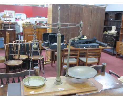 A Set of Early XX Century Brass Shop Scales, on mahogany base, 50cm wide.