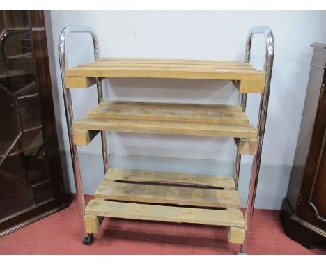 A Vintage Three-Tier Chrome and Wood Industrial Trolley, 65.5cm wide.