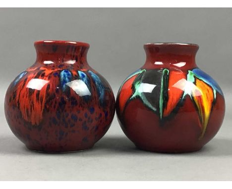 TWO POOLE POTTERY VASES,each 10.5cm high