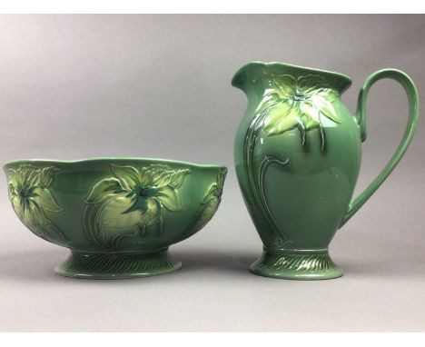 ART NOUVEAU STYLE EWER AND BASIN,by Cherwell, decorated in relief with stylised floral designs, the ewer 25cm high