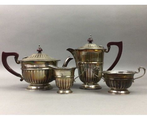 SILVER FOUR PIECE TEA SERVICE,comprising tea pot, water pot, cream and sugar, Birmingham 1941 approx 995g