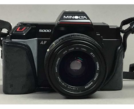 MINOLTA 5000 SLR CAMERA,with three lenses and other accessories