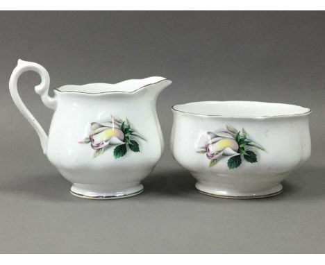 ROYAL ALBERT TEA SERVICE,decorated with white roses, along with a mid 20th century handpainted tea service