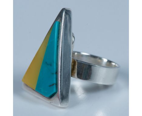 Unique sterling silver triangle set with a light Baltic butterscotch amber and turquoise stone. The band is stamped ER and 92