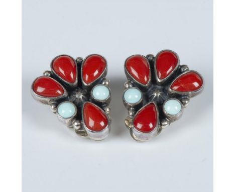 Beautiful hand crafted Southwestern Native American clip-on earrings with coral and turquoise stones set in sterling silver. 