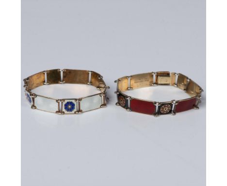 Both of these beautiful guilloche bracelets are set in a gold washed sterling silver. The first is a lovely white and blue. F
