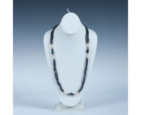Beautiful and unique necklace. Triple strands of small onyx beads with fresh water pearls and 14k gold beads at each end. Eac