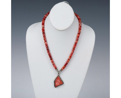 Gorgeous Southwest Native American Indian piece marked TE Sterling on the back. The pendant is red spiny oyster shell set in 