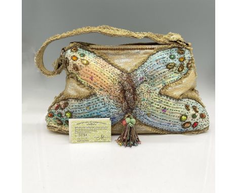 Bag designed with rhinestones, beading and gilt lace accents. Rainbow colored fabric over silver and gold toned material. Top