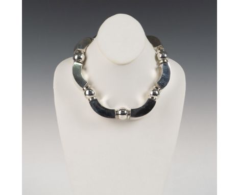 Beautiful sterling silver necklace by the Southwestern jewelry artist, Luis Mojica. It measures approximately 18"L and weighs