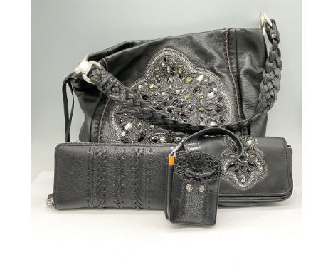 Black soft leather with top stitching down sides with center rhinestone design. Convenience pocket on back. Braided shoulder 