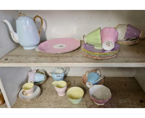 2 SHELVES OF ROYAL STANDARD BONE CHINA TEA SERVICE INCL; CUP &amp; SAUCERS, CAKE PLATE &amp; TEA POT 