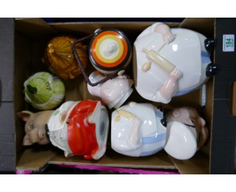 A mixed collection of ceramic novelty items to include Crown Devon cookie jars, similar pickle jars etc 