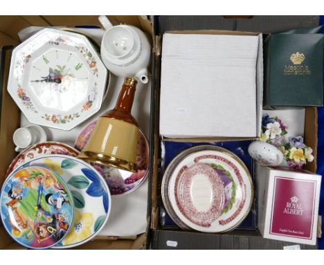 A Collection of decorative wallplates, ceramic clocks, Waade Whiskey decanters, Wedgwood Peter Rabbit teapot, cups and saucer