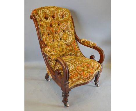 A William IV Mahogany Drawing Room Chair with a button upholstered back and serpentine seat raised upon turned tapering legs