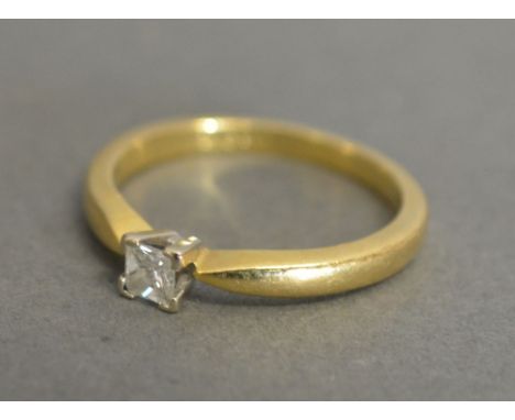 An 18ct. Yellow Gold Solitaire Diamond Ring