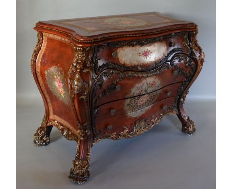 A French Style Bombe Commode of Bombe Form with three drawers and cabriole legs, 100 cms wide