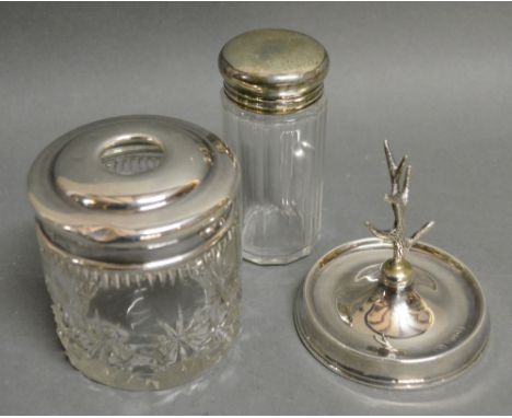 A London Silver Ring Tree, together with a silver topped and cut glass dressing table bottle and another similar