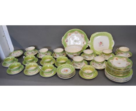 An Early 19th Century English Tea Service, together with another similar Grosvenor China tea service