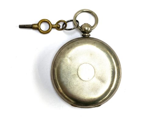 A late 19th/early 20th century silver cased pocket watch, the engine turned case stamped Fine Silver to interior, enamel dial