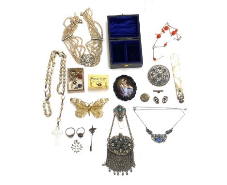 A quantity of jewellery to include a white metal filigree and mesh chatelaine purse, the butterfly lid with turquoise glass c