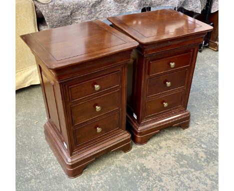 A pair of John Lewis bedside cabinets, each with single cushion drawer over three further drawers on bracket feet with panell
