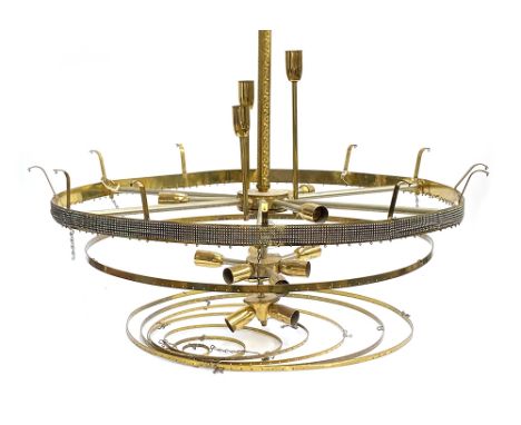 A gilt metal multi fitting chandelier with eight suspended tiers 77cmW (AF)