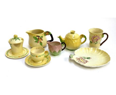 A quantity of Carlton ware to include Buttercup teapot; Water lily jug; apple blossom jug, etc