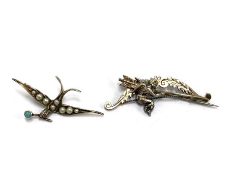 An early 20th century white metal pendant in the form of a swallow set with pearls, 4cmL; together with a white metal brooch 