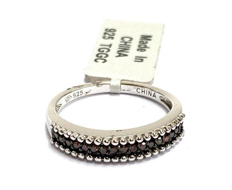 A new 925 silver and treated red diamond half eternity ring, size N 1/2, 2.4g