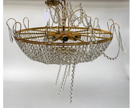A gilt metal and cut metal swag chandelier, with ten light fittings, approx 60cmW