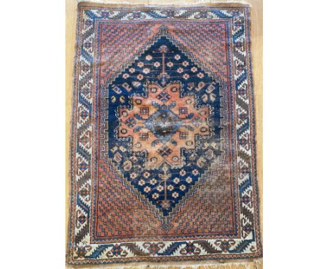 A small West Persian rug, with central lozenge, 160x109cm