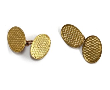 A pair of 9ct gold cufflinks with engine turned detail, 4.2g