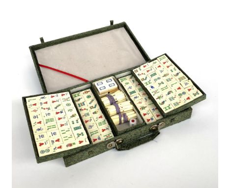 A cased bone and bamboo Mahjong set containing 144 pieces
